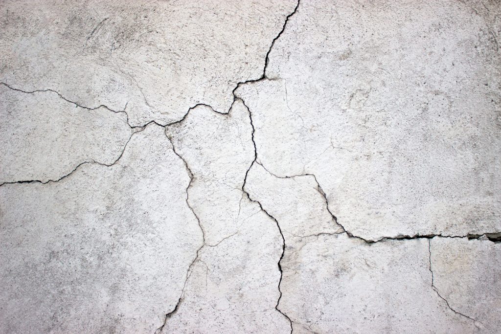 Pressure Washing is a Must Before Repairing Concrete Cracks