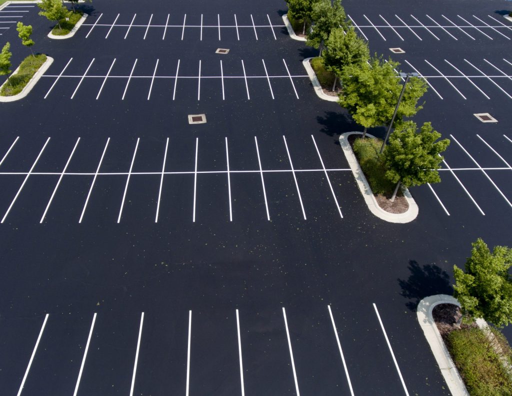 4 Areas in Your Parking Lot That Need Pressure Washing the Most